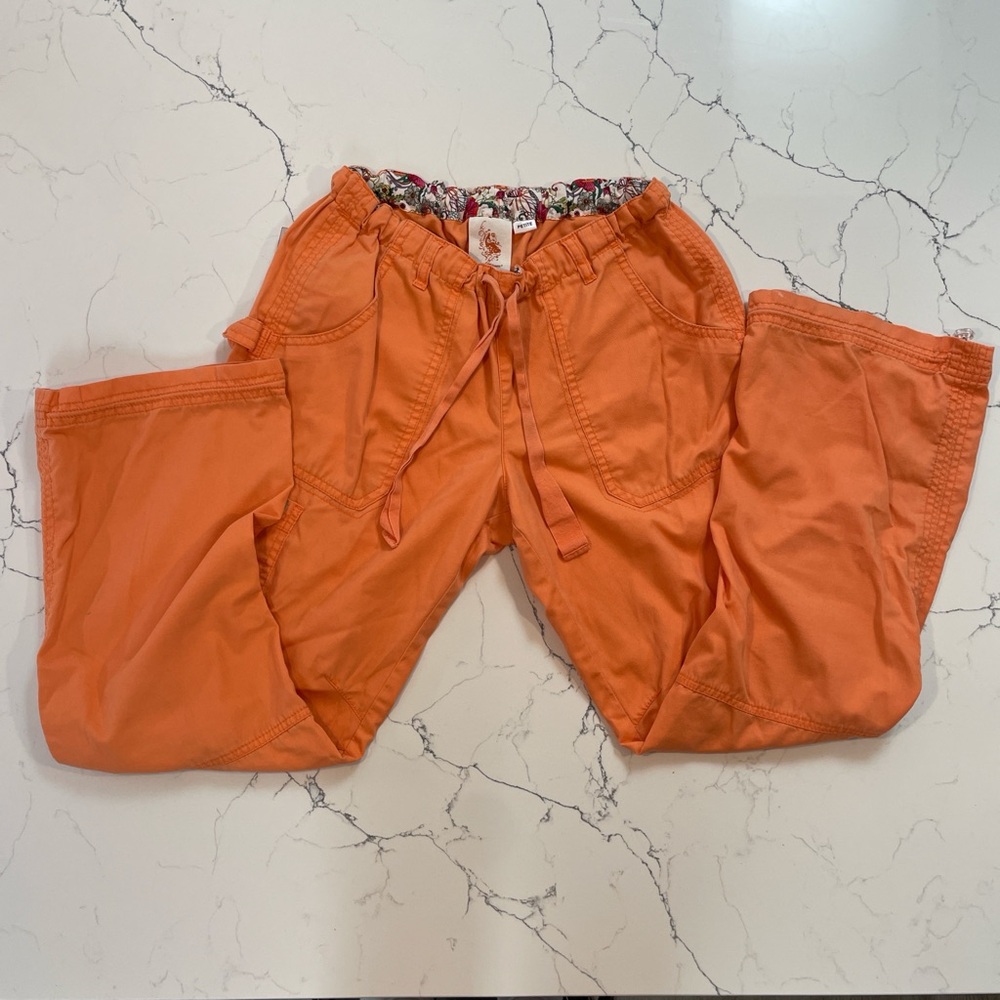 Kathy Peterson Orange pants